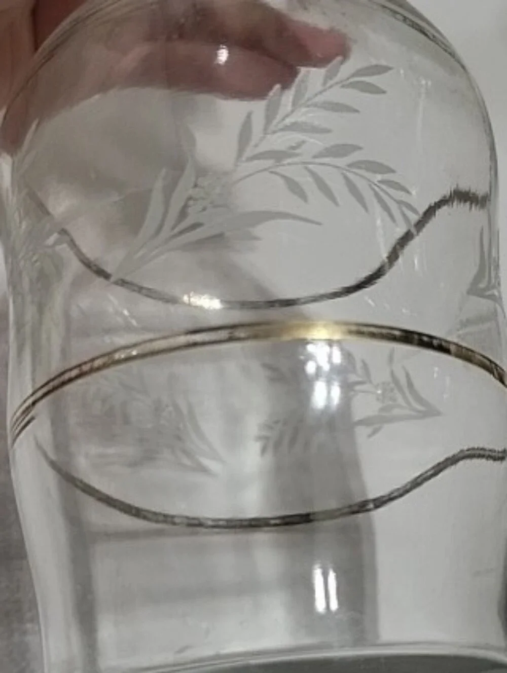 Clear Glass Decanter with Gold Accent and Leaf Etching.